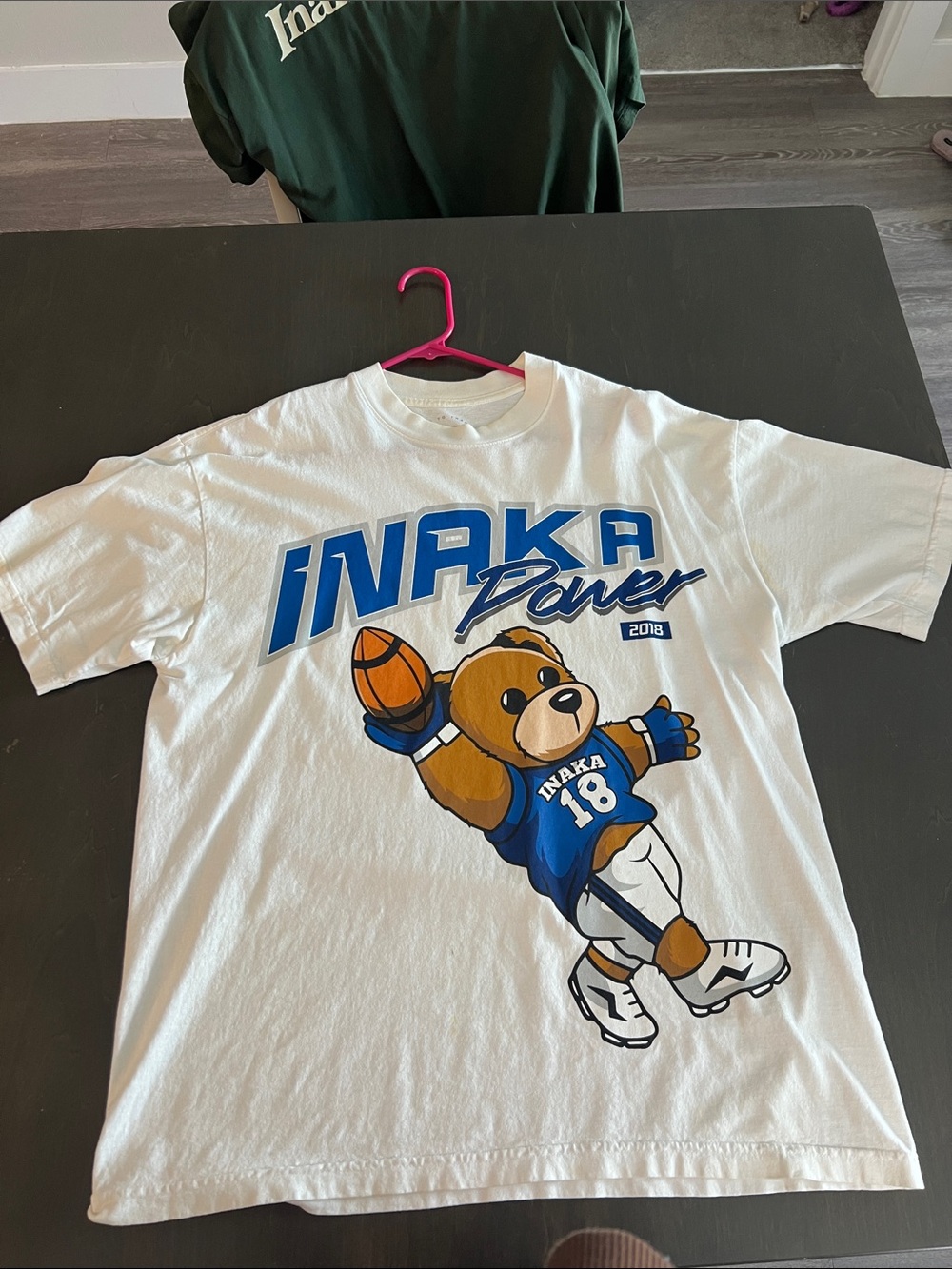 Inaka Power White Tee with Blue and Orange Bear Graphic